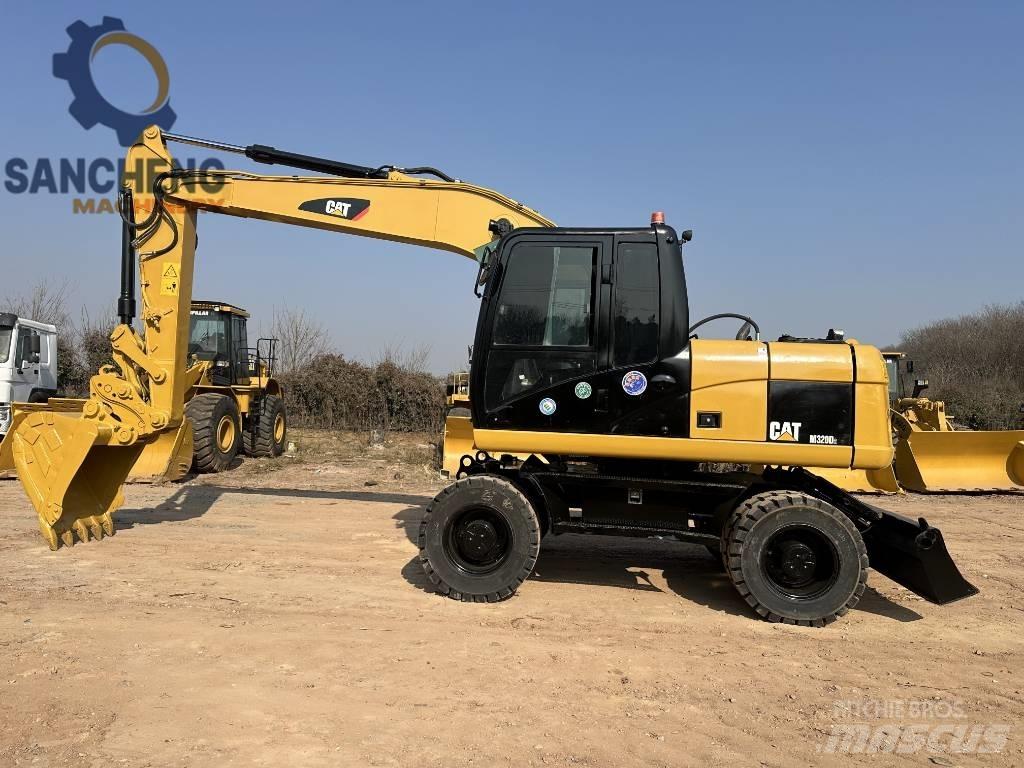CAT M320D Wielgraafmachines