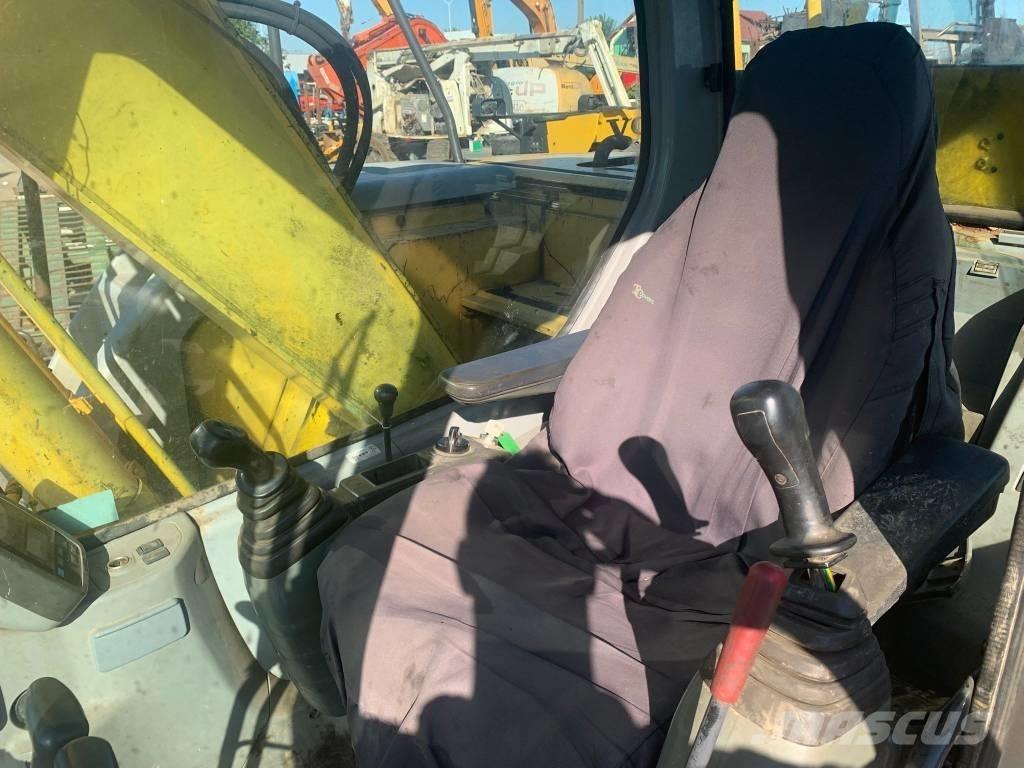 New Holland E 135 SR Rupsgraafmachines
