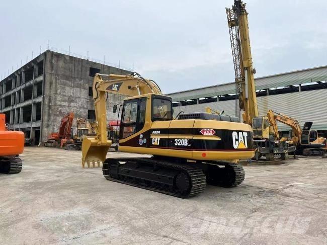 CAT 320 BL Rupsgraafmachines