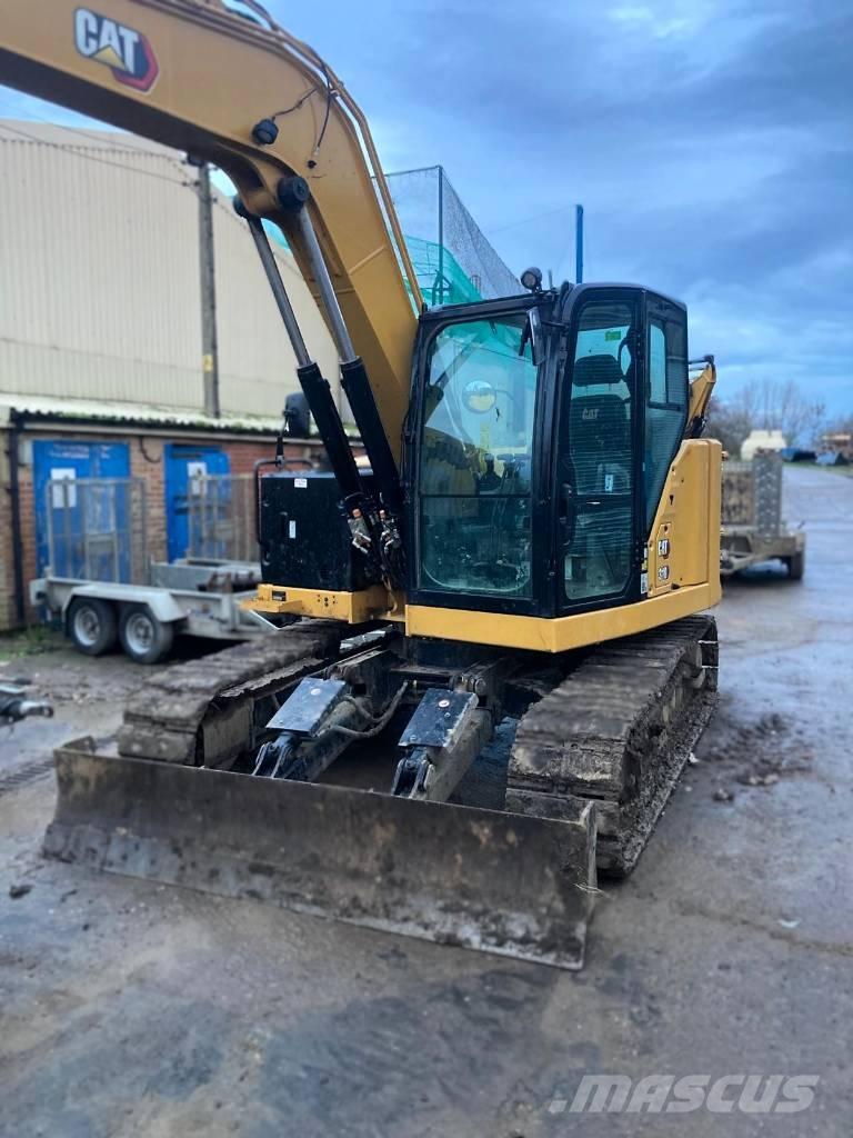 CAT 310 Rupsgraafmachines