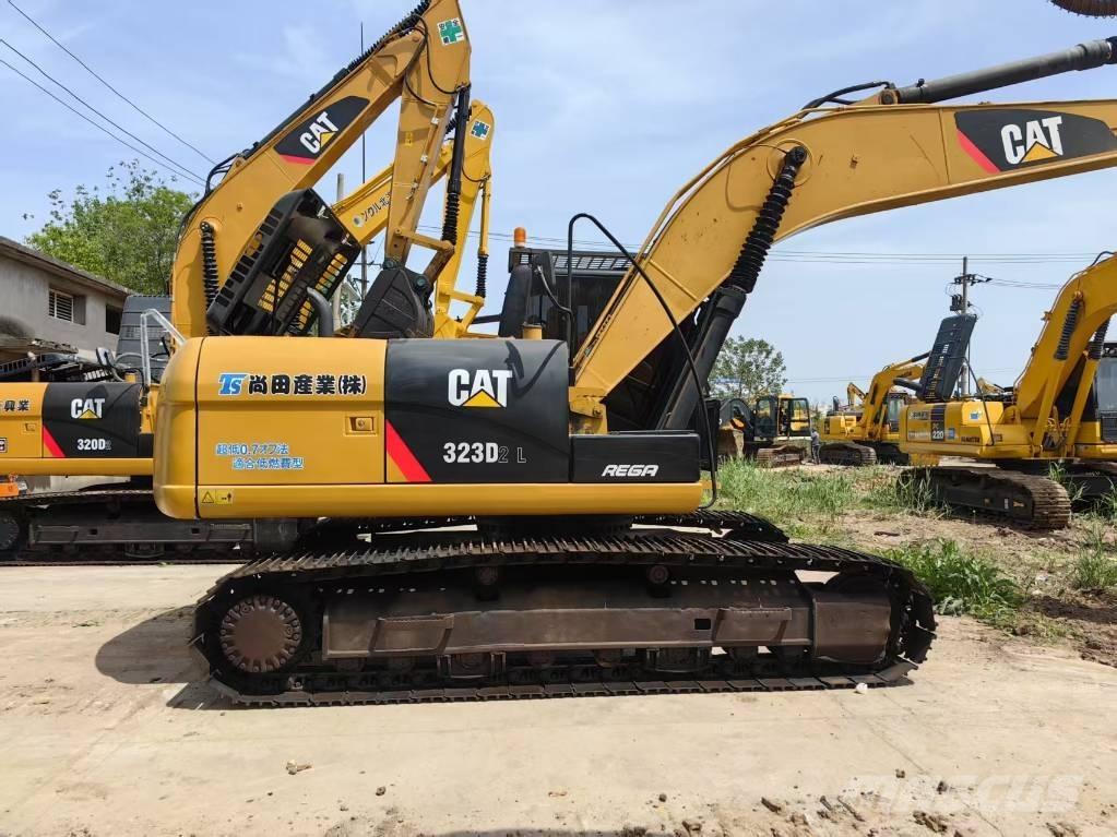 CAT 323 D Rupsgraafmachines