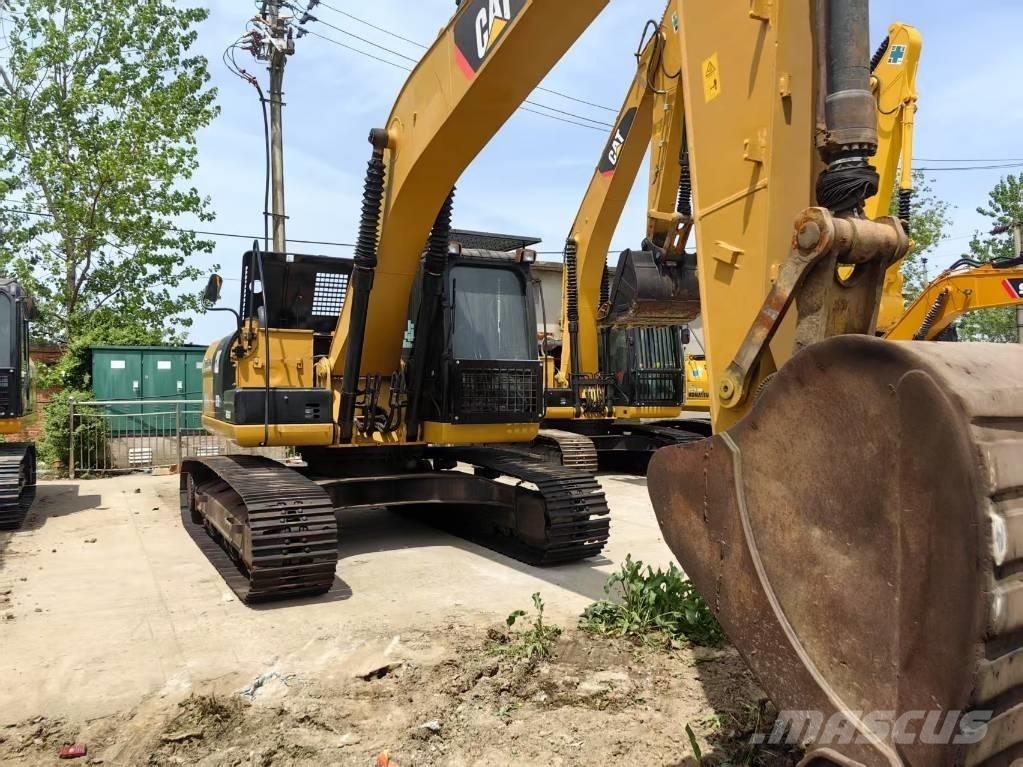 CAT 323 D Rupsgraafmachines