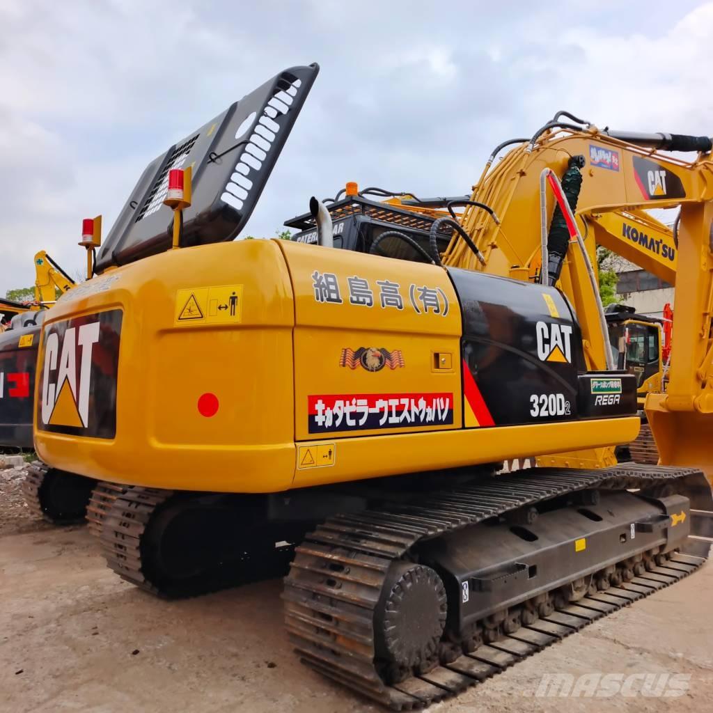CAT 320 Rupsgraafmachines