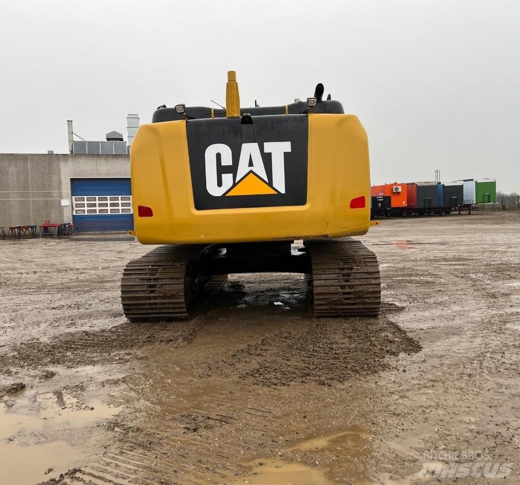 CAT 323 F L Rupsgraafmachines