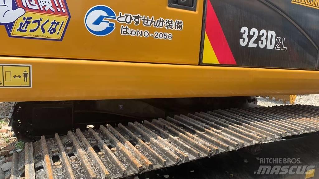 CAT 323 Rupsgraafmachines