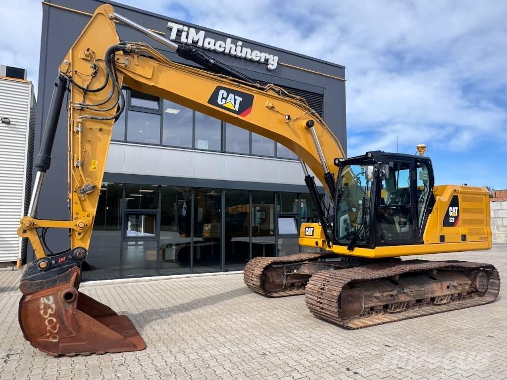 CAT 323 Rupsgraafmachines