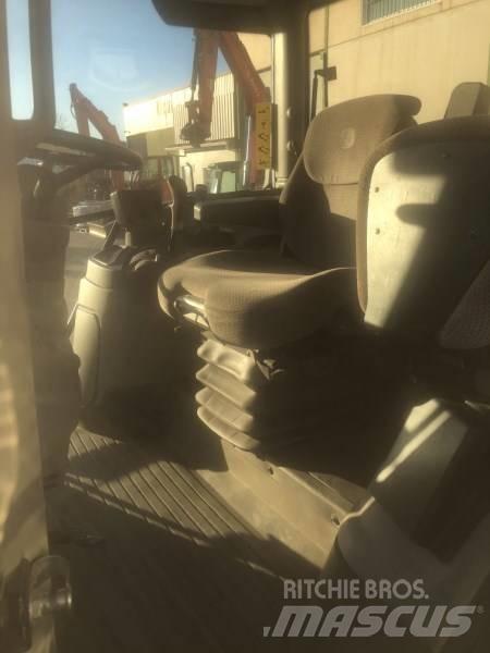 John Deere 6115 R Tractoren
