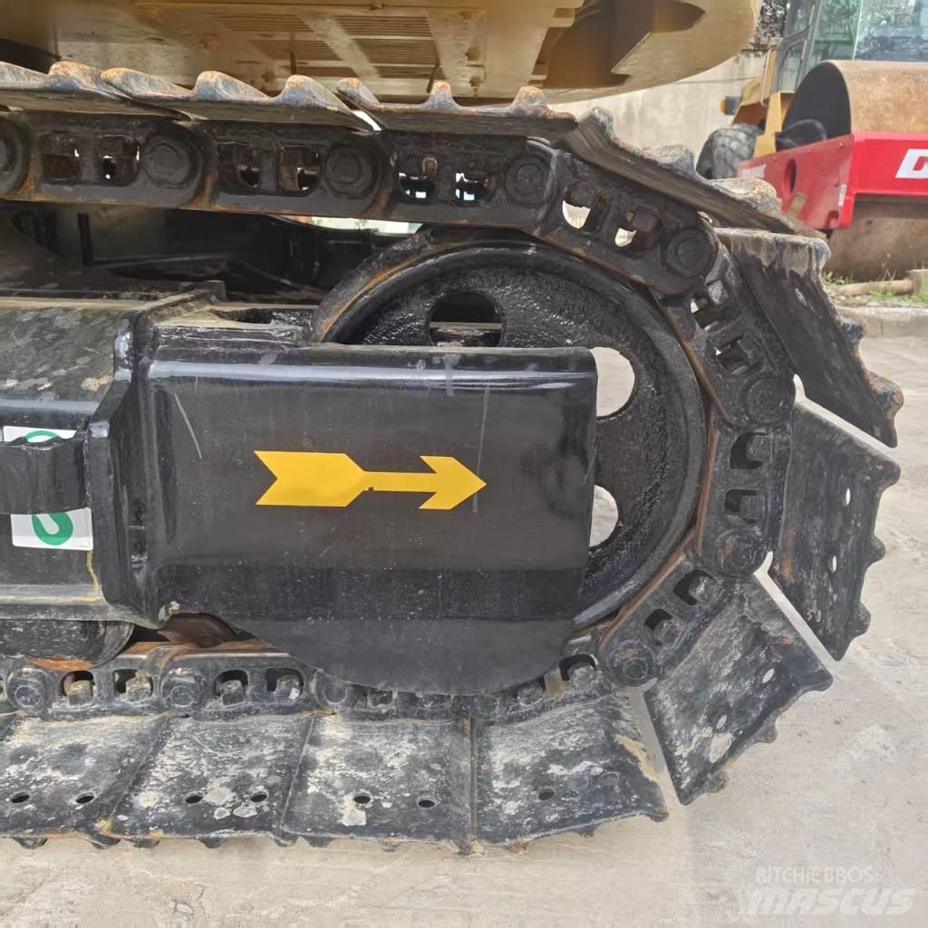 CAT 310 Rupsgraafmachines