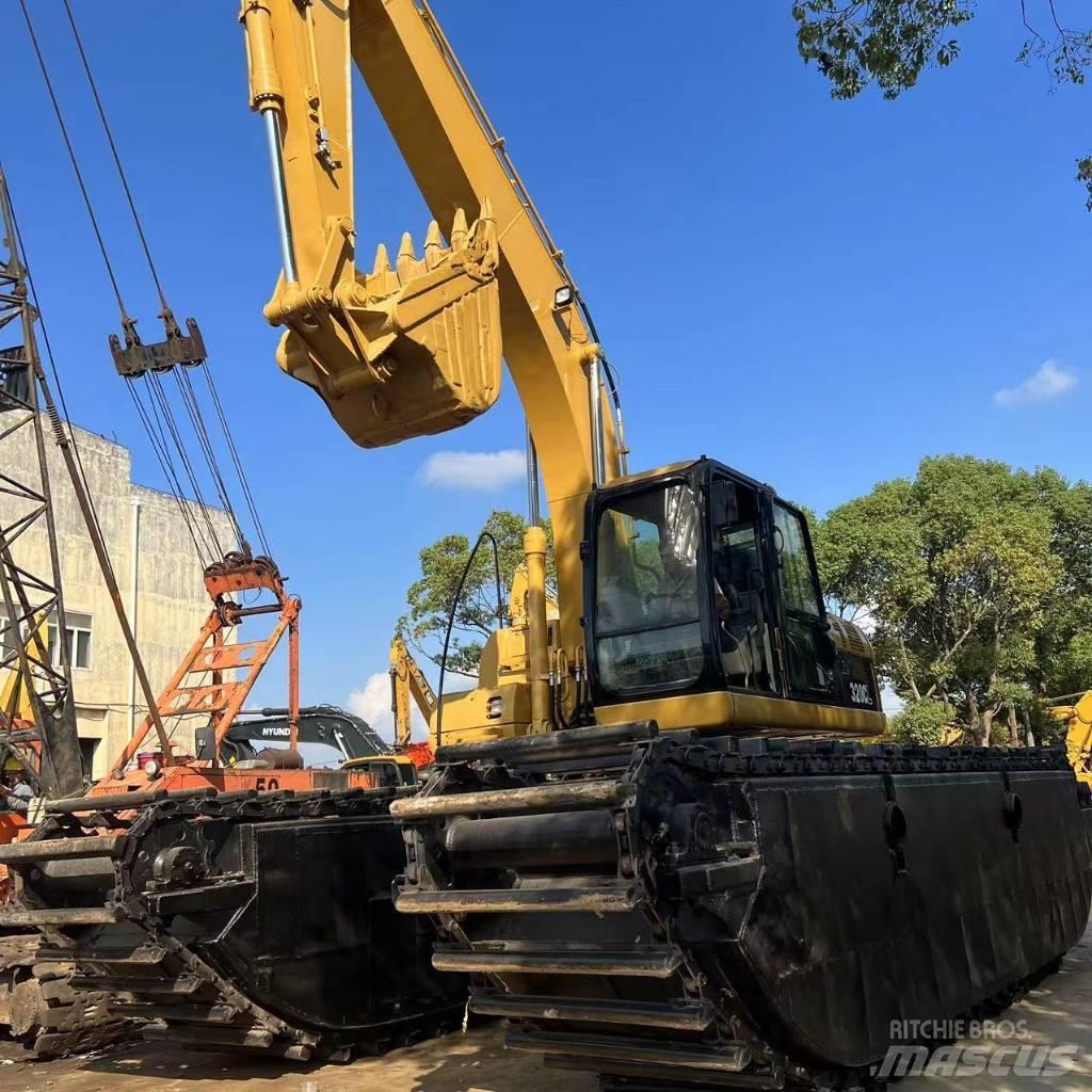 CAT 320 C Amfibische graafmachines