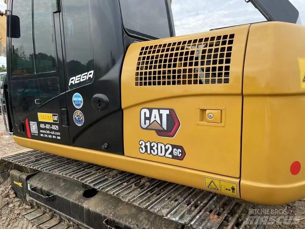 CAT 313 Rupsgraafmachines