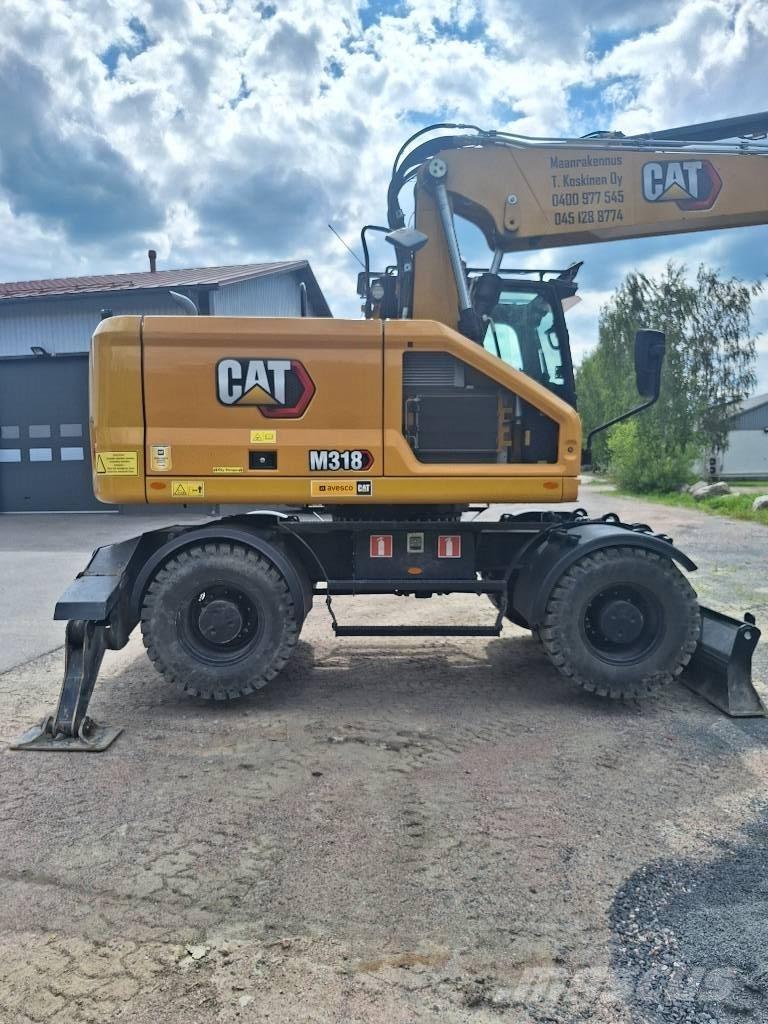 CAT M 318 Wielgraafmachines