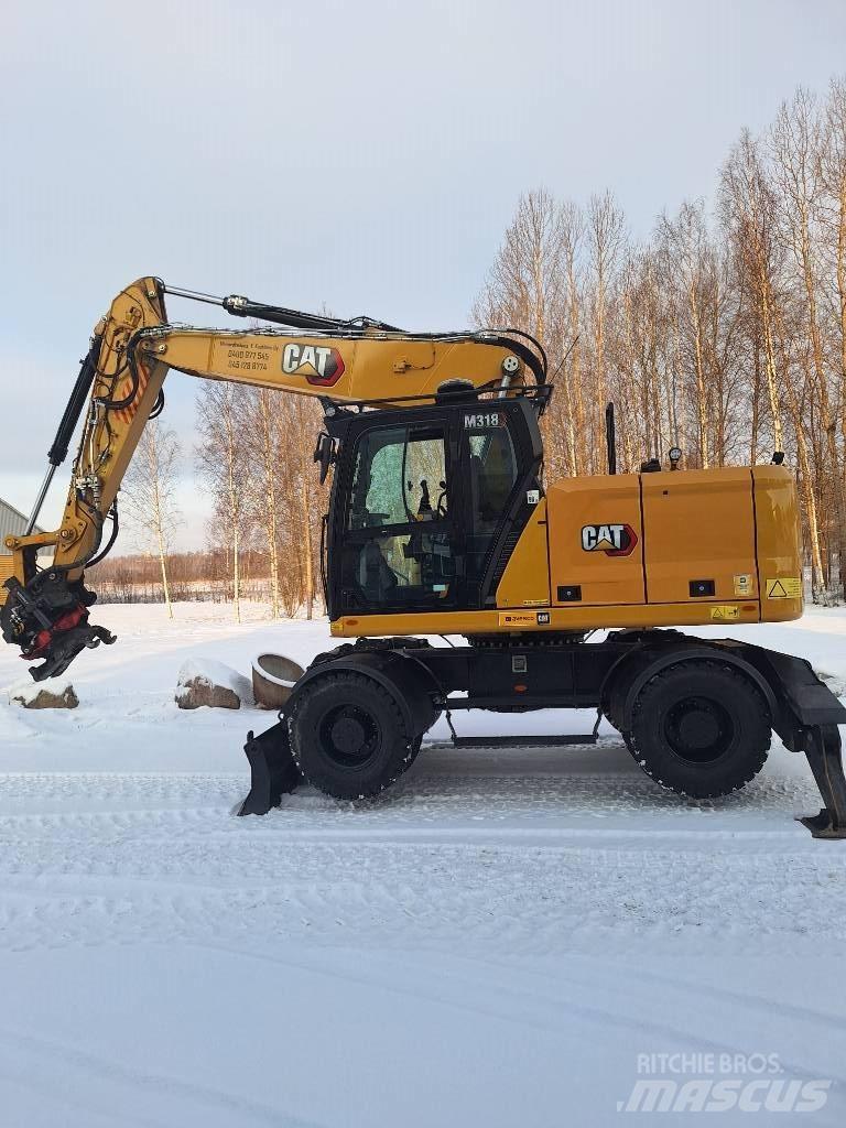 CAT M 318 Wielgraafmachines
