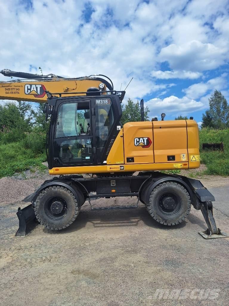 CAT M 318 Wielgraafmachines