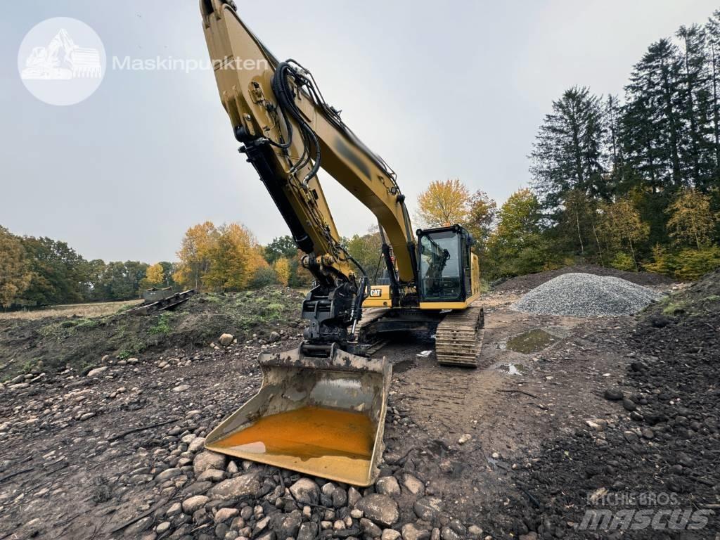 CAT 323 Rupsgraafmachines
