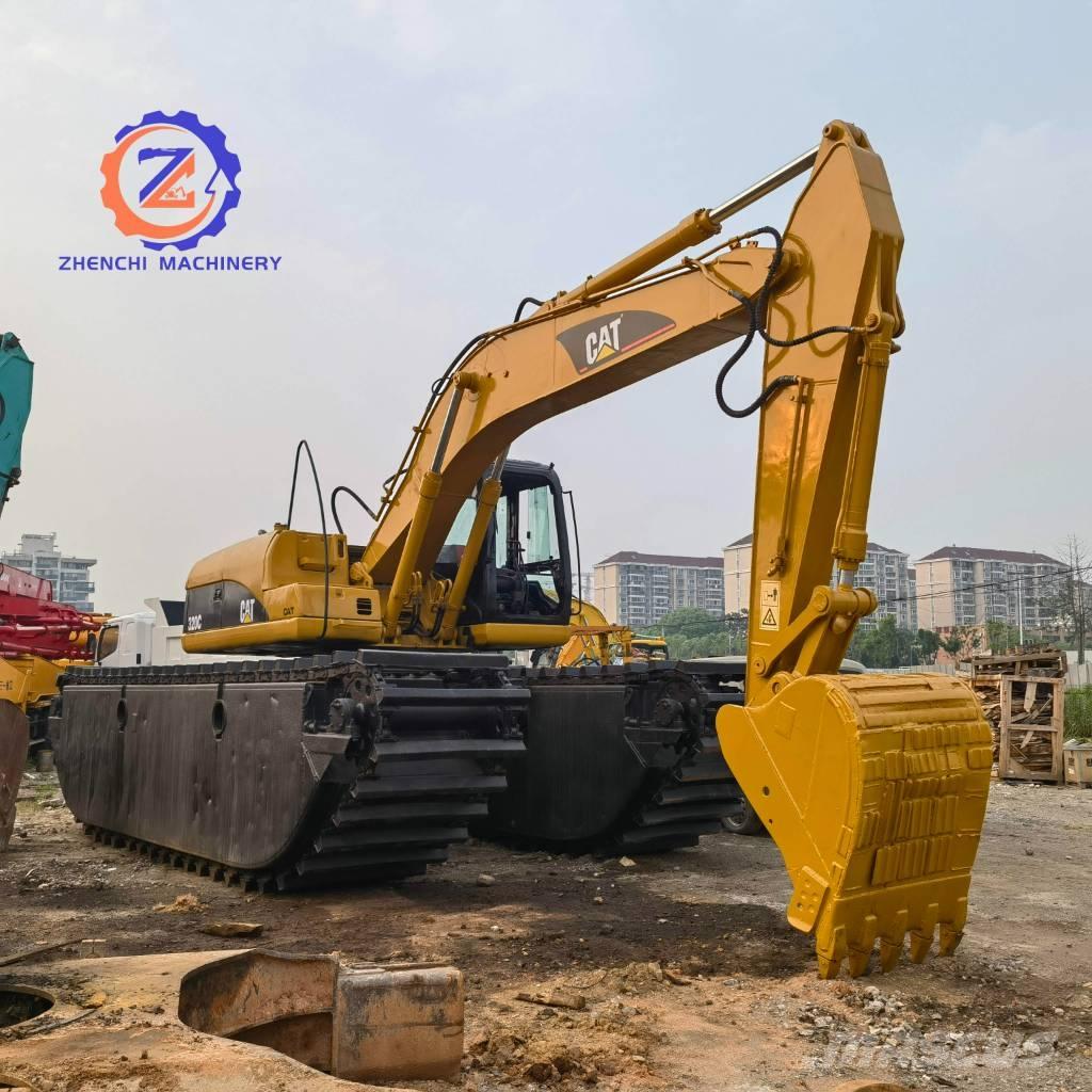 CAT 320 C Amfibische graafmachines