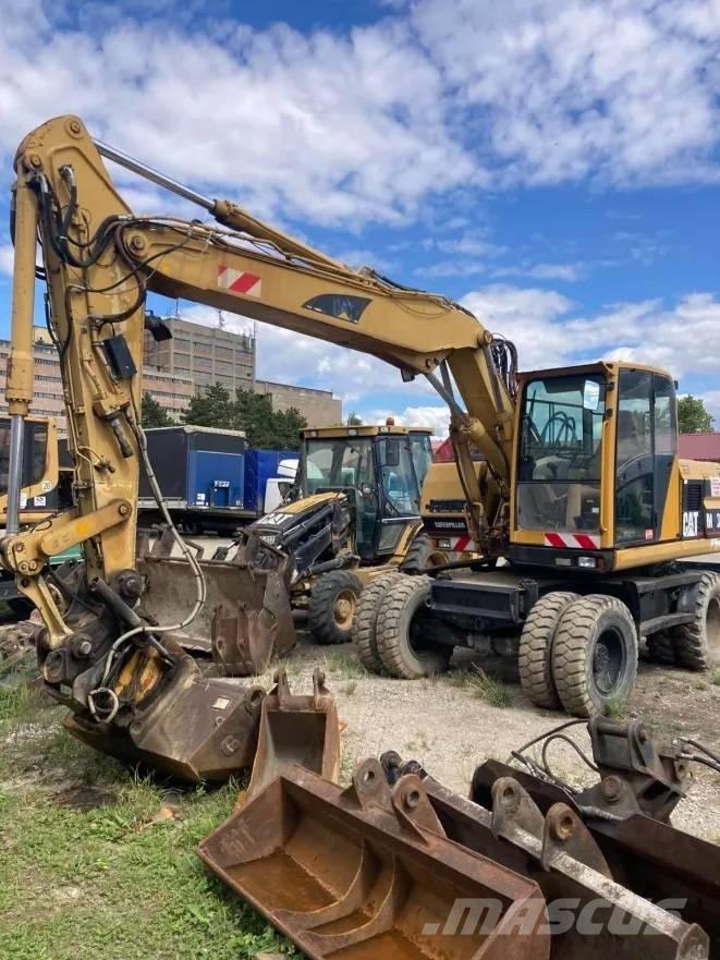 CAT M 312 Wielgraafmachines
