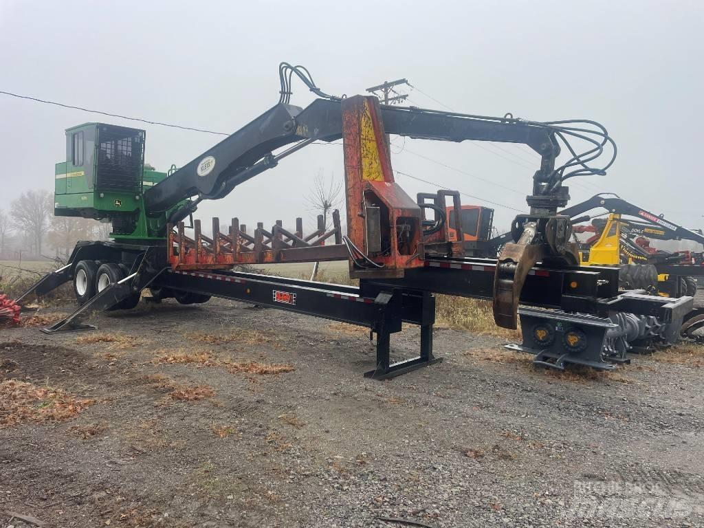 John Deere 437 D Boomstamladers