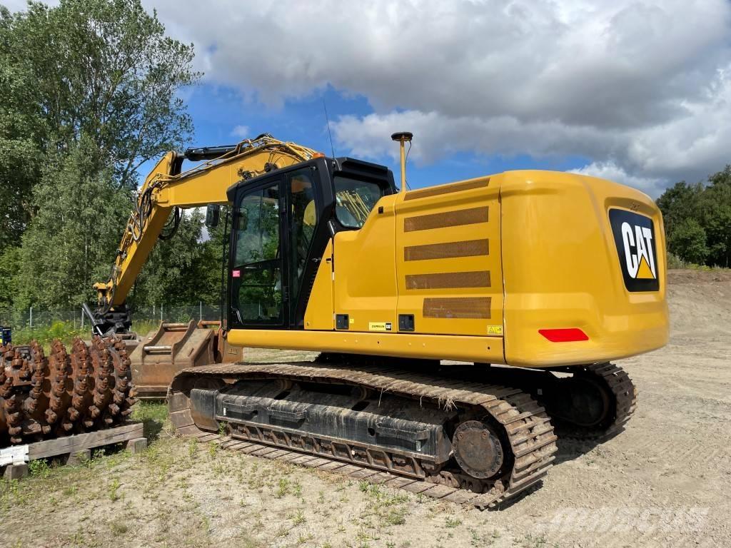 CAT 323 Rupsgraafmachines