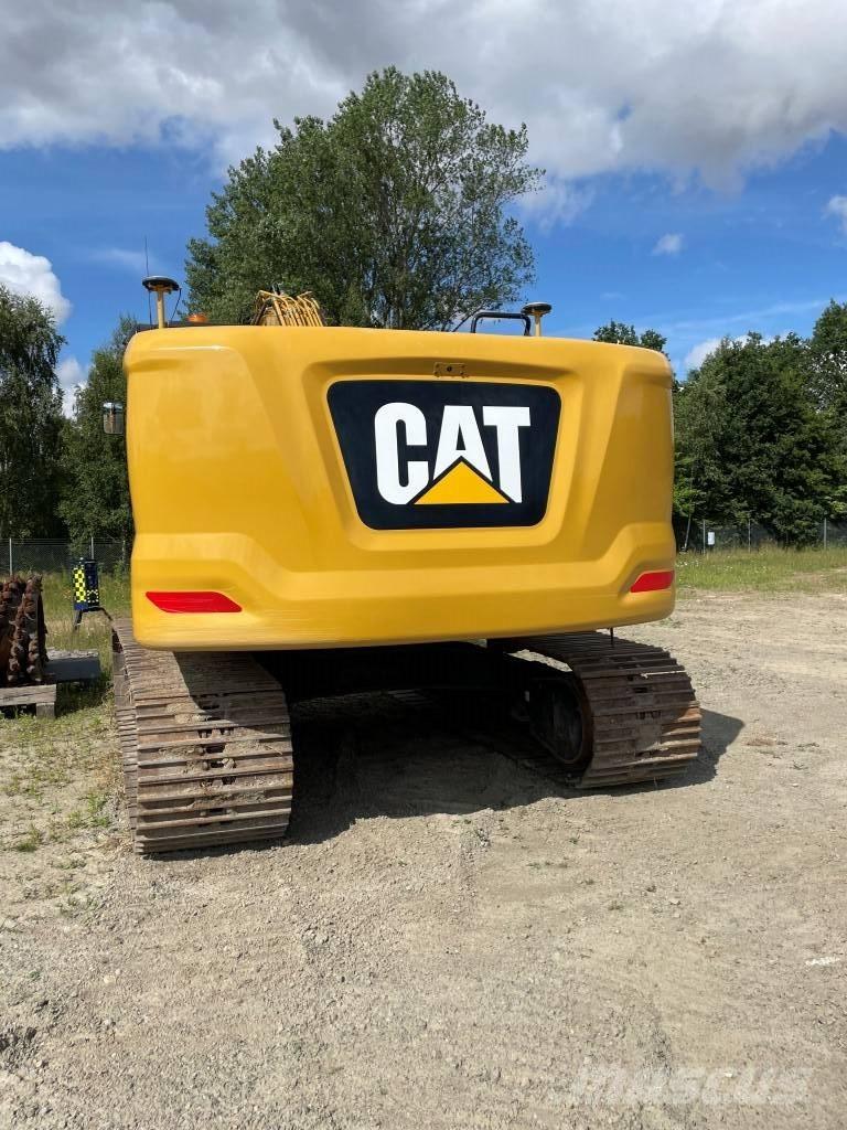 CAT 323 Rupsgraafmachines