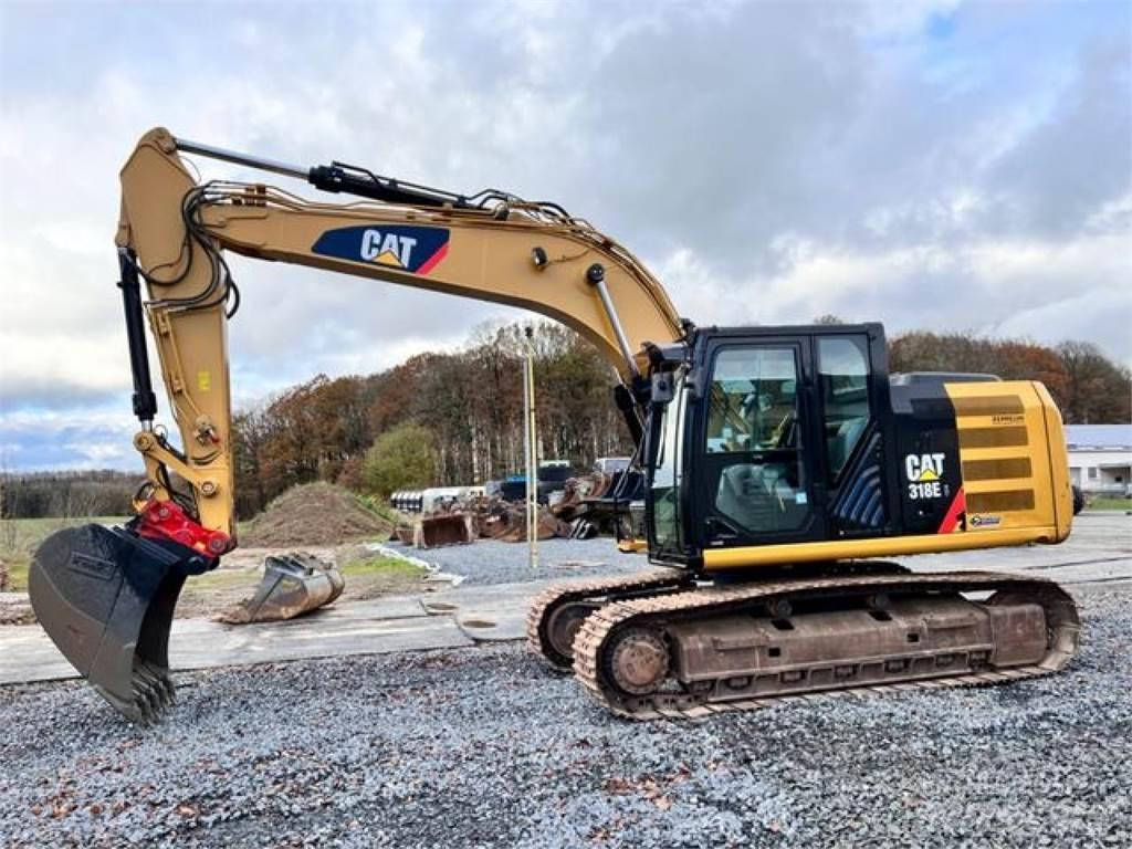 CAT 318EL + HS21 Rupsgraafmachines