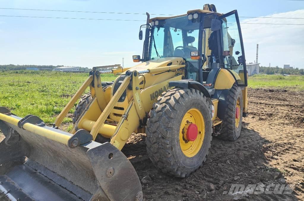 Komatsu WB97S-5E0 Graaf-laadcombinaties