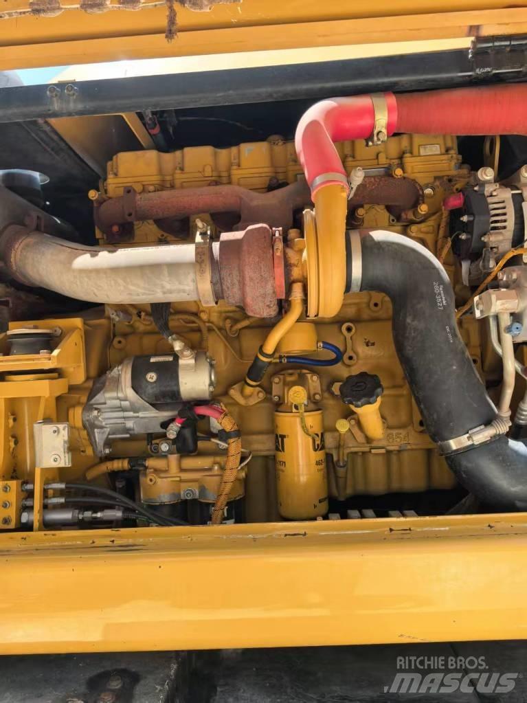 CAT M 320 Wielgraafmachines