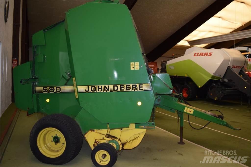 John Deere 580 Ronde-balenpersen