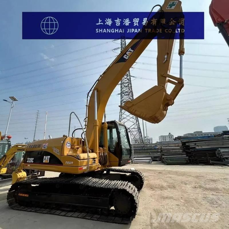 CAT 318 Rupsgraafmachines