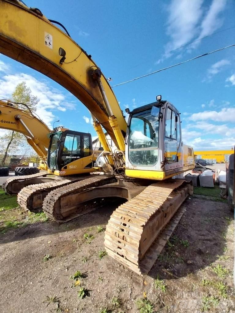 New Holland E 305 Rupsgraafmachines