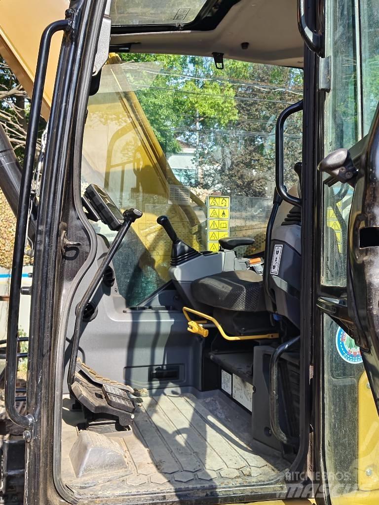 CAT 310 Rupsgraafmachines