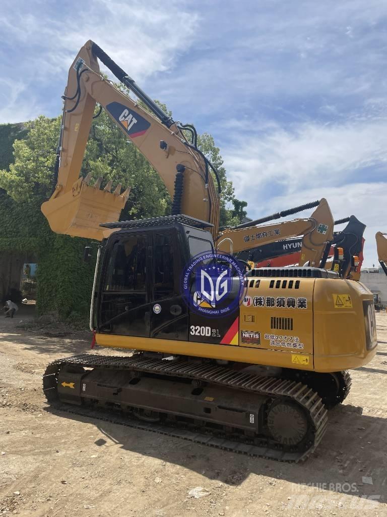 CAT CAT323 Rupsgraafmachines