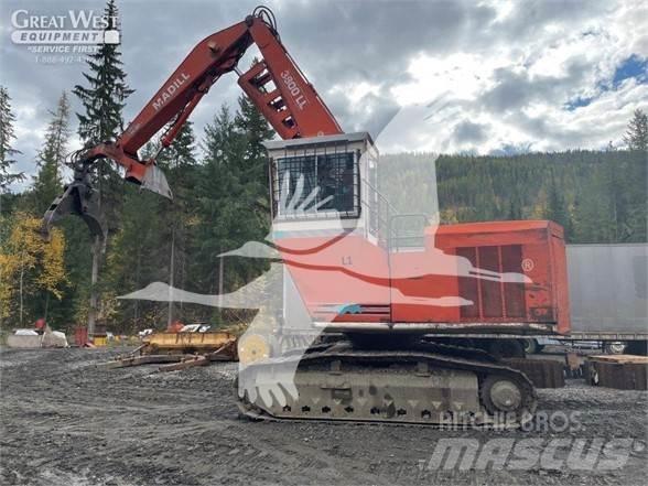 Madill 3800 Boomstamladers