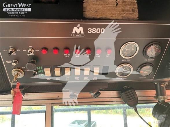 Madill 3800 Boomstamladers