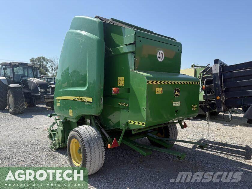 John Deere 864 Ronde-balenpersen