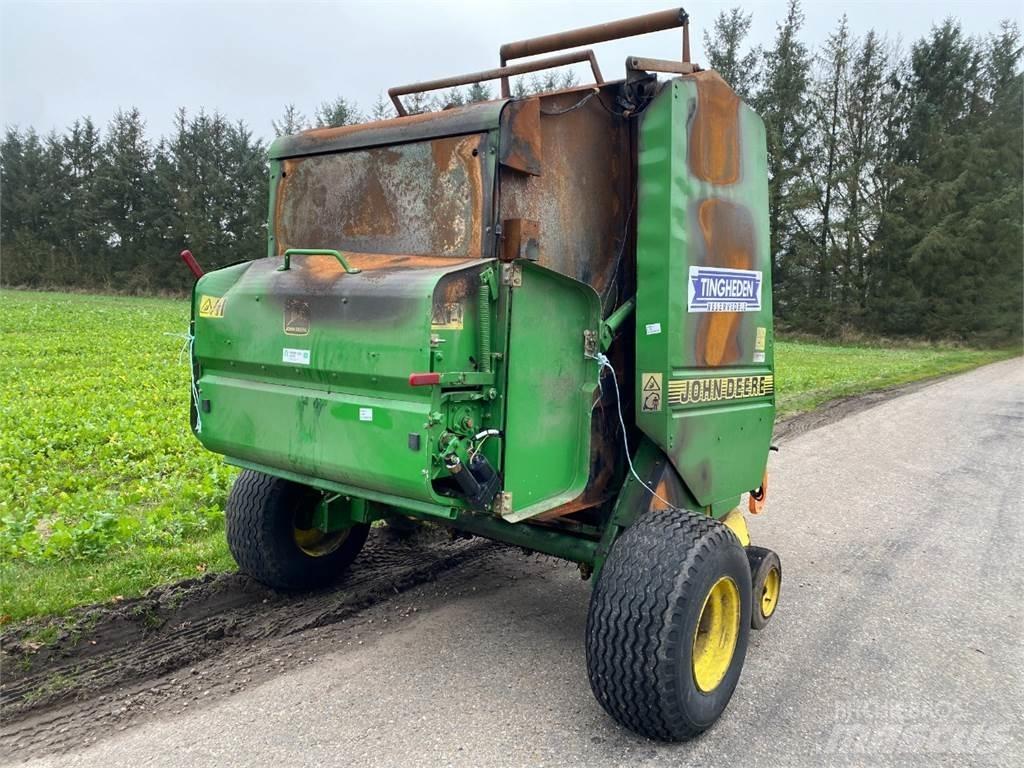 John Deere 580 Ronde-balenpersen
