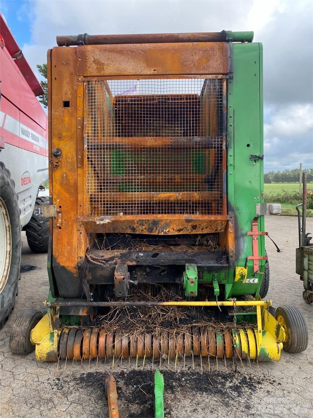 John Deere 590 Ronde-balenpersen