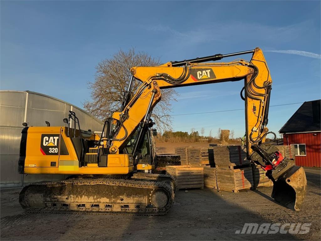 CAT 320 Rupsgraafmachines