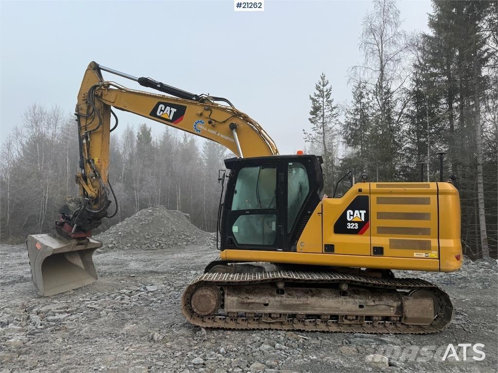 CAT 323 Rupsgraafmachines