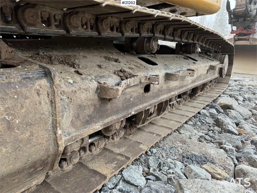 CAT 323 Rupsgraafmachines