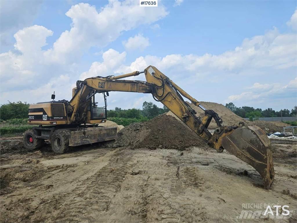 CAT M312 Wielgraafmachines