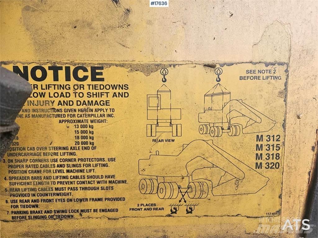 CAT M312 Wielgraafmachines