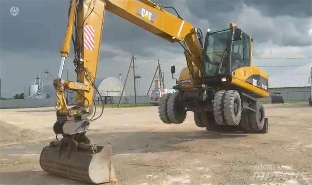 CAT M315C Wielgraafmachines