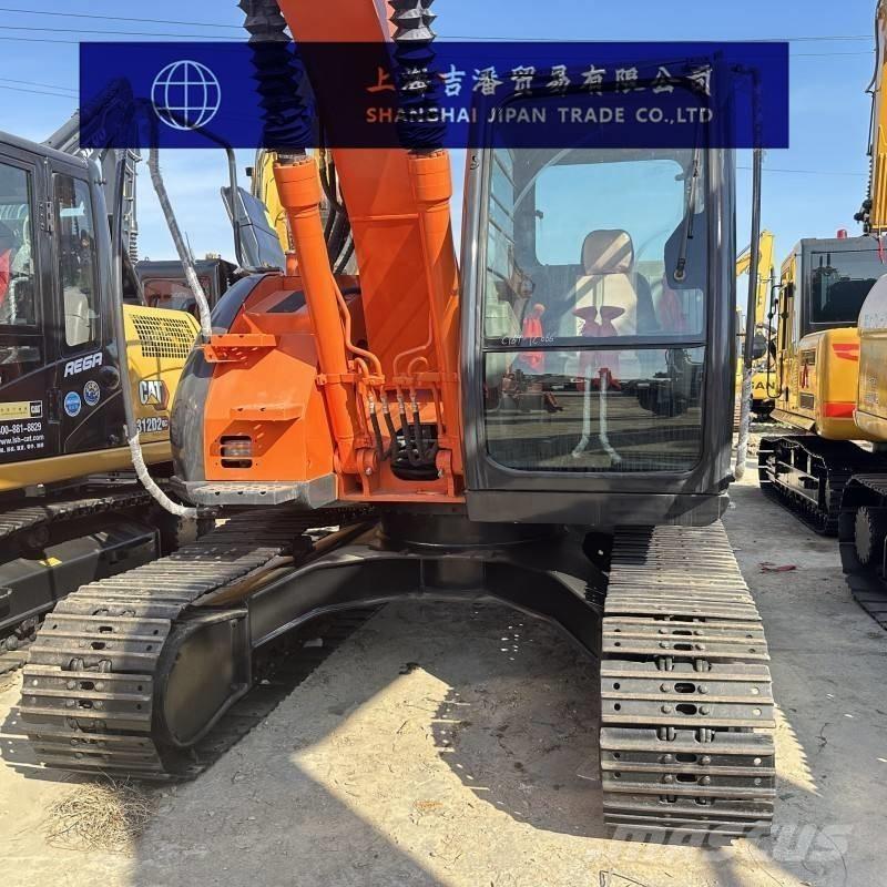 Hitachi ZX 135 Rupsgraafmachines