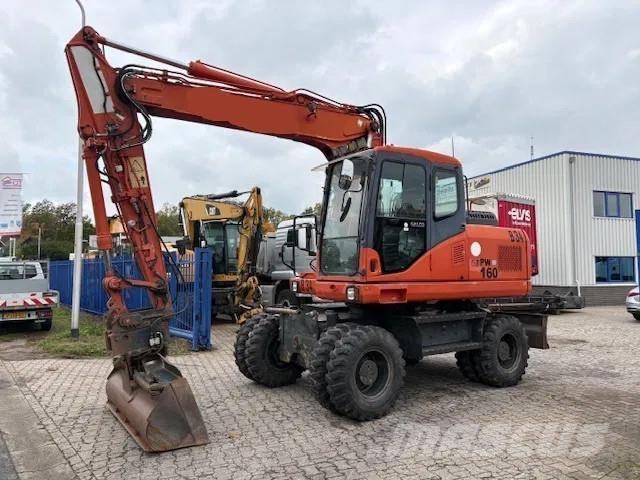 Komatsu PW 160 - 7EO Wielgraafmachines