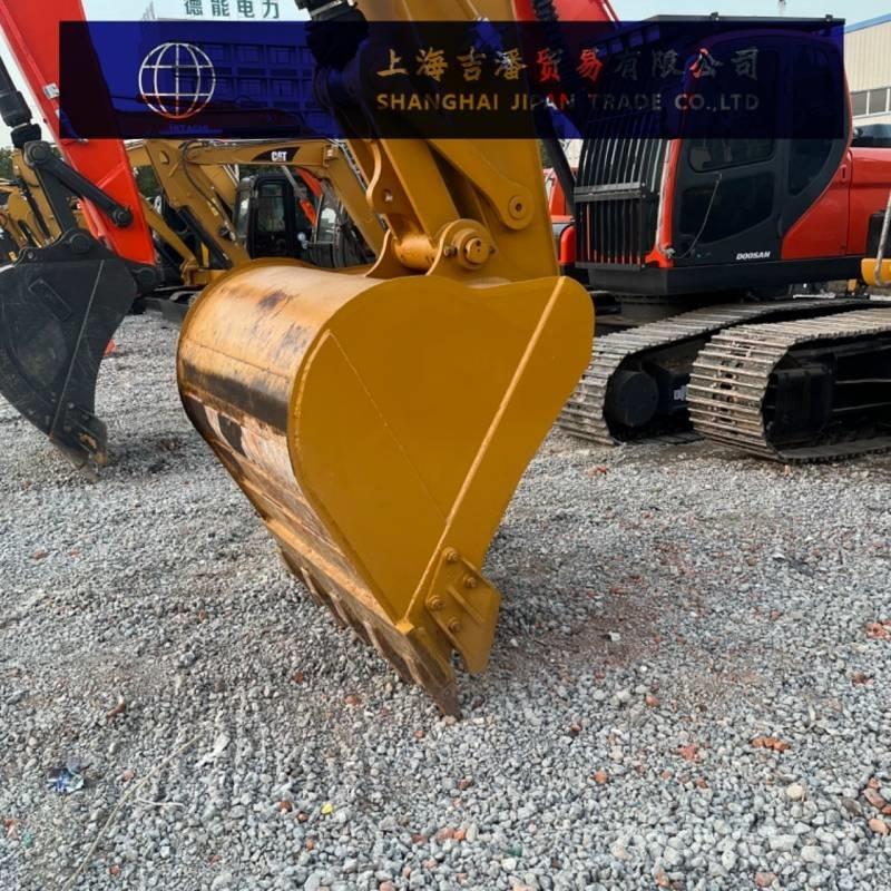 CAT 323 D Rupsgraafmachines