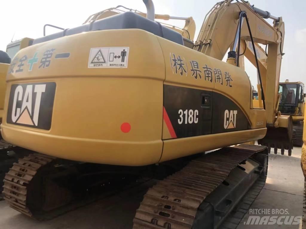 CAT 318C Rupsgraafmachines