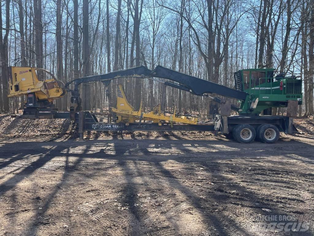 John Deere 437 D Boomstamladers