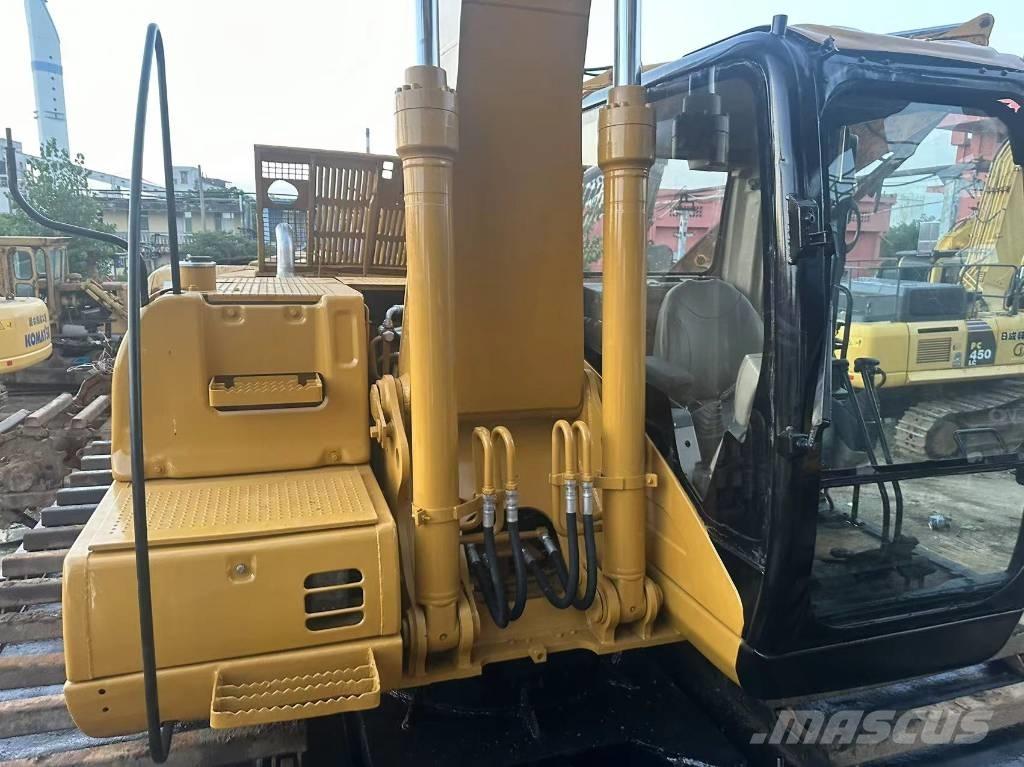 CAT 320 C Amfibische graafmachines