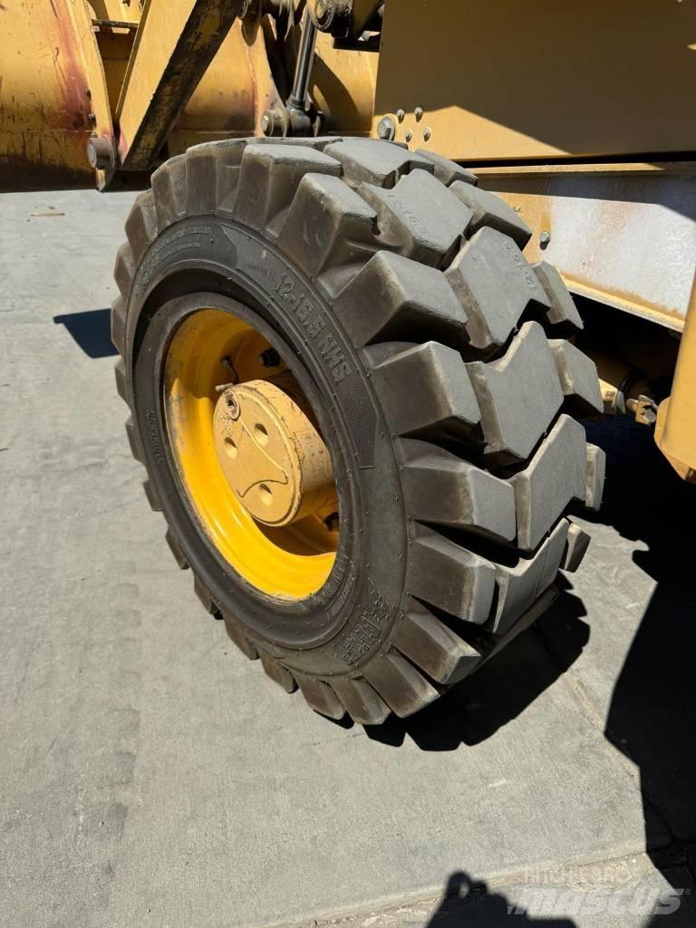John Deere 310 G Graaf-laadcombinaties