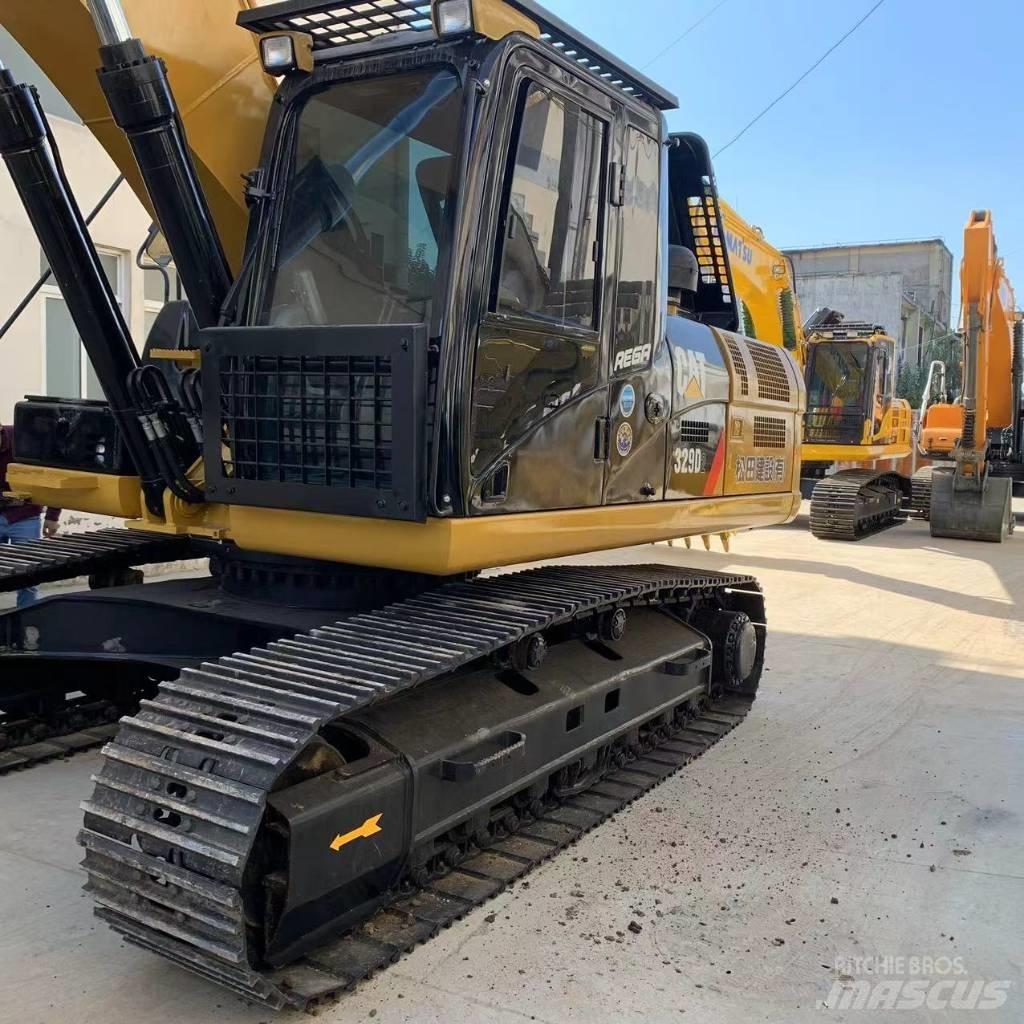 CAT 329 E Rupsgraafmachines